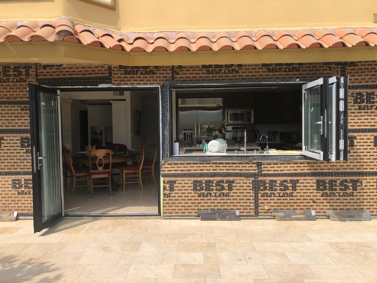 Black Framed Aluminum And Glass Bifolding Door And Window Open