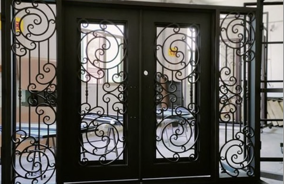 Contemporary steel entry doors with slim horizontal openings and long vertical bar handles.