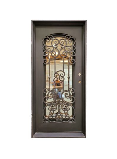 Decorative wrought iron entry door with scrollwork on solid frame